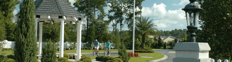 Residents of Peppertree Crossing, a 55+ active retirement community in Brunswick, GA, enjoy a relaxing bike ride around their friendly neighborhood.
